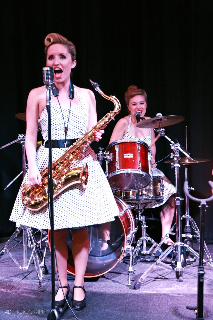 Sophie singing and Sarah Drumming for The Daisy Chains